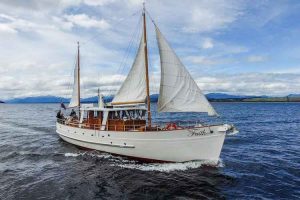 Lake Te Anau - historic motor yacht cruise aboard Faith - Luxury solo tours